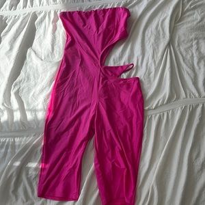 Neon pink romper with side cutout